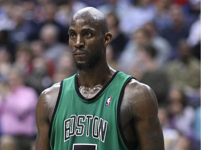 Kevin Garnett wearing the green and black Boston Celtics basketball uniform.