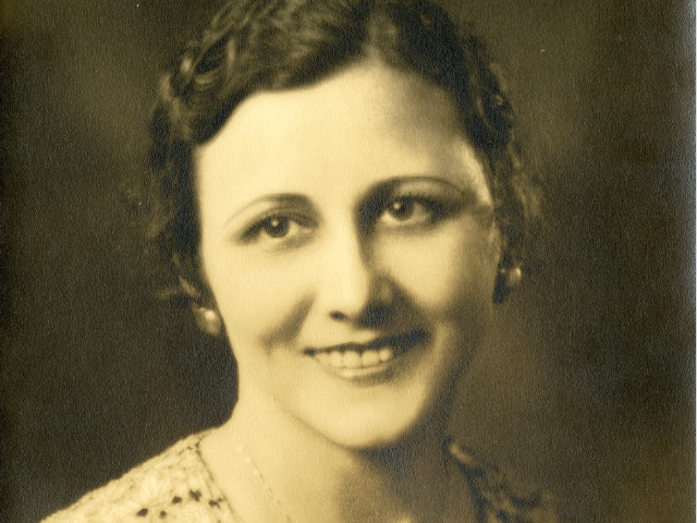 A young Martha Fitzgerald smiling. 