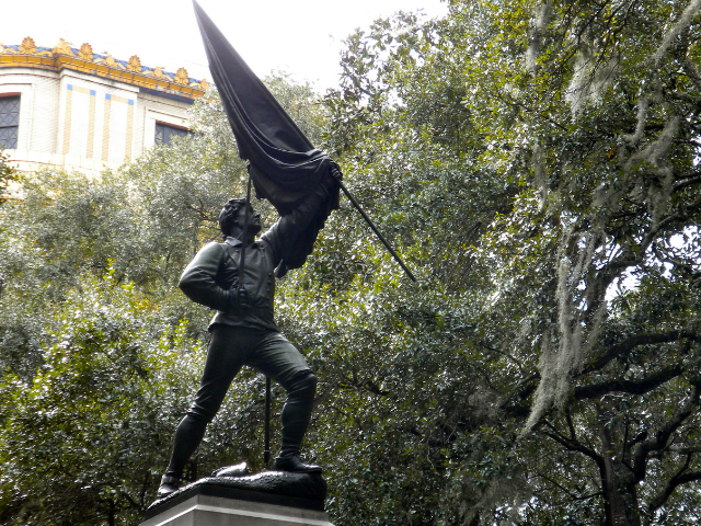 Statue of William Jasper holding the South Carolina flag. 