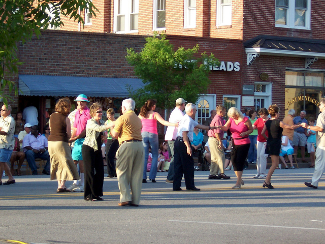 people dancing in the street