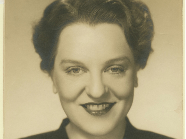 Black and white photograph of Gwen Bristow smiling