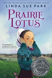 A young girl taking her bonnet off in a prairie. 