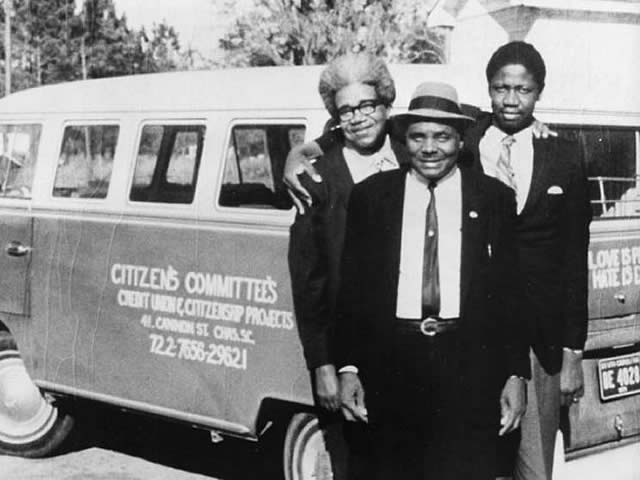 Esau Jenkins with bus used to provide students with transportation