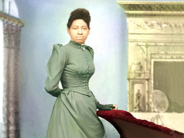 Color photograph of Elizabeth Wright wearing green dress
