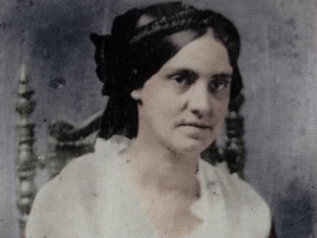 Color photograph of Phoebe Yates Pender sitting in a chair