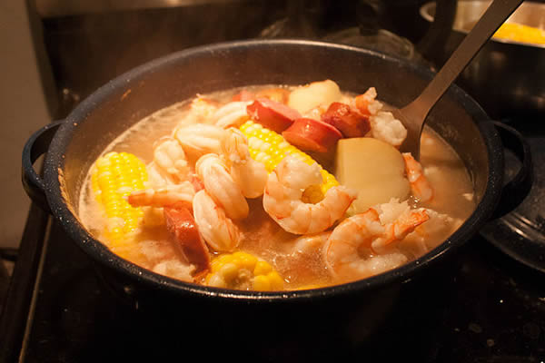 Shrimp boil, or Lowcountry Frogmore Stew, is a traditional dish from the southeast coast of the United States which consists of shrimp, corn on the cob, sausage, and red potatoes.